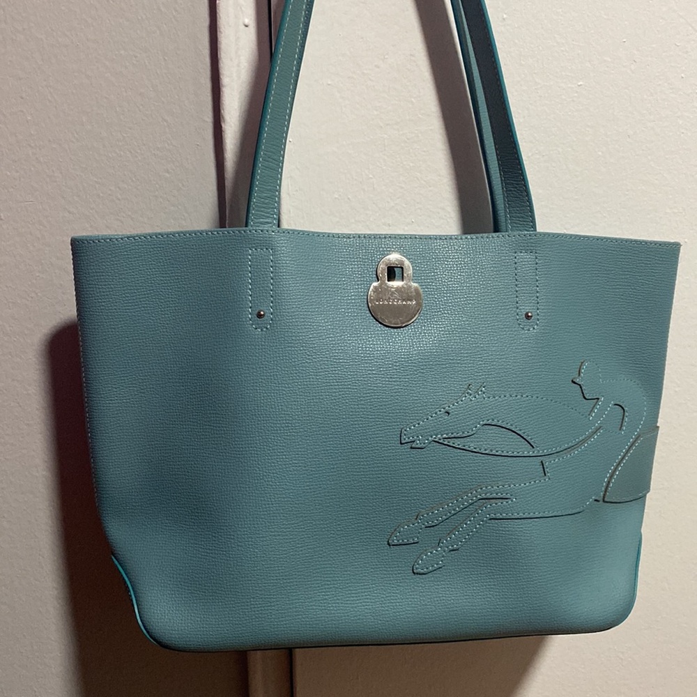 Pristine light blue leather Longchamp tote with silver square lock, never used.